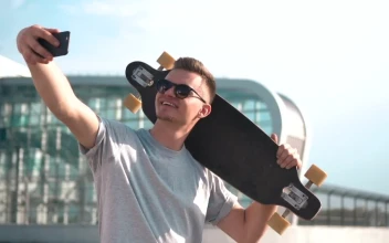 Free Video Stock Smiling Skater Takes Selfie For Social Media
