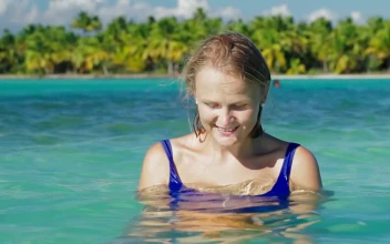 Free Video Stock Smiling Woman Holding A Starfish