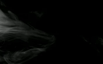 Free Video Stock Smoke Floating Slowly On Dark Background