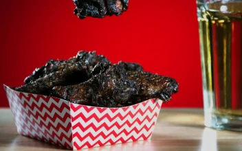 Free Video Stock Smoked Chicken Wings Falling Into The Table