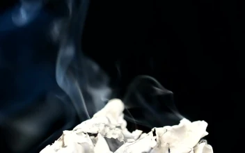 Free Video Stock Smoking Paper Burning Slowly