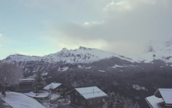 Free Video Stock Snow Capped Mountains And A Small Town