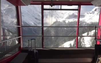 Free Video Stock Snow Capped Mountains Seen From Cable Car Station
