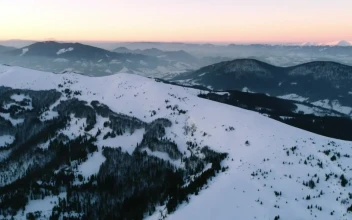 Free Video Stock Snow Covering A Landscape In The Mountains