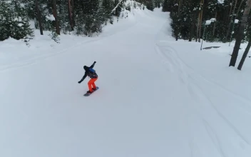Free Video Stock Snowboarding Down A Small Hill