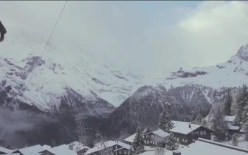 Free Video Stock Snowy Mountains Above A Small Town