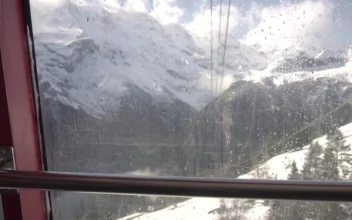Free Video Stock Snowy Mountains Seen From A Cable Car Station