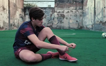 Free Video Stock Soccer Player Ties His Laces