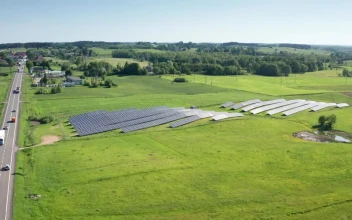 Free Video Stock Solar Panels Next To A Small Pond