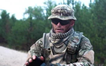 Free Video Stock Soldier Outdoors Shooting The Gun