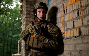 Free Video Stock Soldier With A Gun In Hand Advancing Cautiously