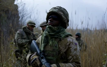 Free Video Stock Soldier With Sunglasses Standing On The Field