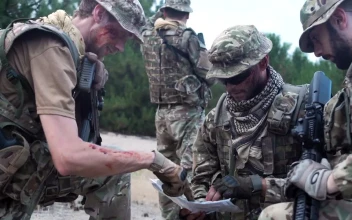 Free Video Stock Soldiers Discussing Where To Go On The Map