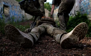 Free Video Stock Soldiers Drag A Wounded Man
