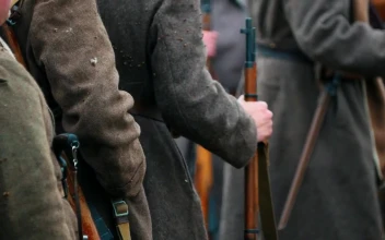 Free Video Stock Soldiers In Coats Standing In A Row Holding Guns