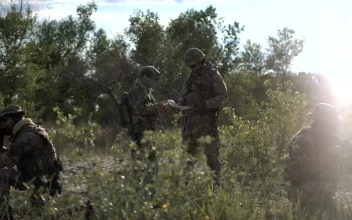 Free Video Stock Soldiers Looking At Map On The Battlefield