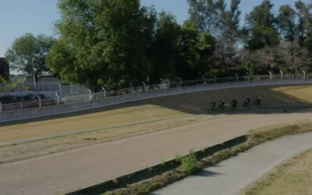 Free Video Stock Some Cyclists Competing On A Track