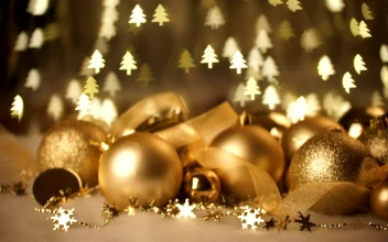 Free Video Stock Sparkling Gold Holiday Ornaments And Tree Lights