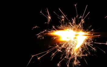 Free Video Stock Sparks Flame Light From The Right Of The Shot