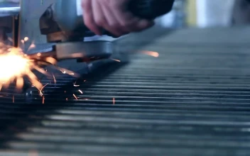 Free Video Stock Sparks From A Grinder In The Factory