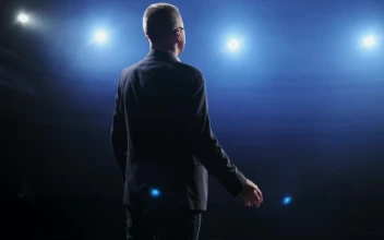 Free Video Stock Speaker In Suit Speaks To His Audience On Stage