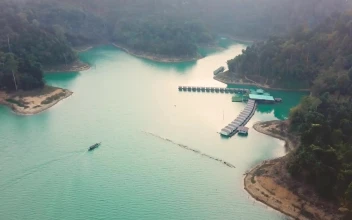 Free Video Stock Speedboat Returning To A Beautiful Bay Seen From The Sky