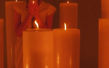Free Video Stock Spiritual Woman Meditating Among Many Candles