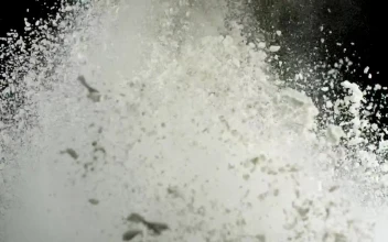 Free Video Stock Splash Of White Powder Against A Dark Screen