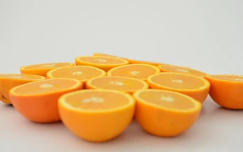 Free Video Stock Split Oranges Rotating On A White Background