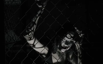 Free Video Stock Spooky Zombie On A Wire Net Fence