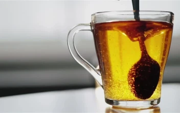 Free Video Stock Spoon Stirring Sugar In Clear Glass Tea Cup