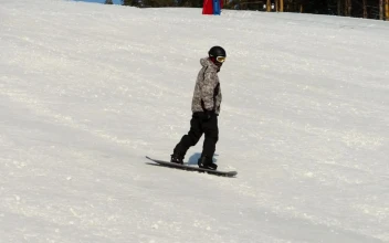 Free Video Stock Sportsman Snowboarding Down The Hill
