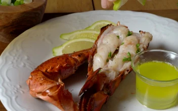 Free Video Stock Squeezing Lemon On Seafood