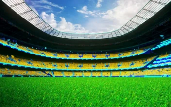 Free Video Stock Stadium Packed With Public Dressed In Yellow Uniform