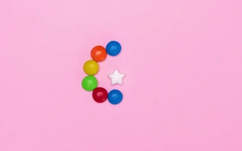 Free Video Stock Star Candy Surrounded By Chocolates On A Pink Background