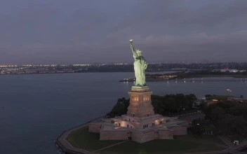 Free Video Stock Statue Of Liberty At Night Aerial View