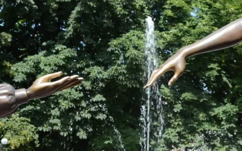 Free Video Stock Statue Reaching Towards Another
