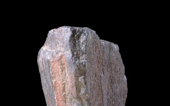 Free Video Stock Stone Rotating On A Black Background