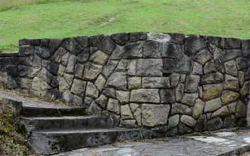 Free Video Stock Stone Wall With A Metal Gate
