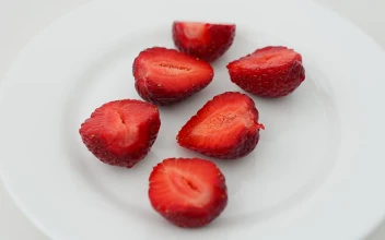 Free Video Stock Strawberry Slices On A Plate