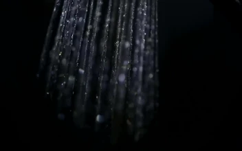 Free Video Stock Stream Of Shower Water On Black Background