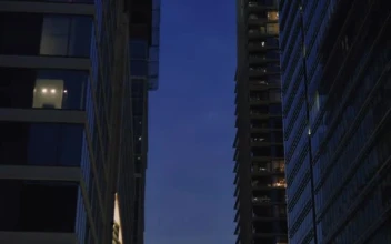 Free Video Stock Street Between Large Buildings At Sunset At Christmas