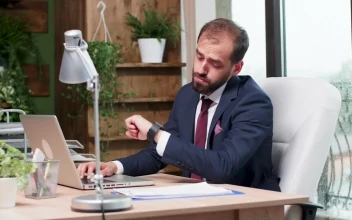 Free Video Stock Stressed Man In Suit Yawns And Types On Laptop