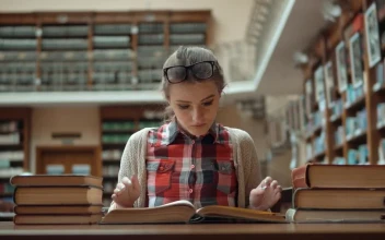 Free Video Stock Stressed Student Studies For Exam In Library