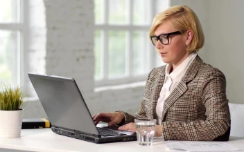 Free Video Stock Stressed Woman Treats Headache While Working On Laptop