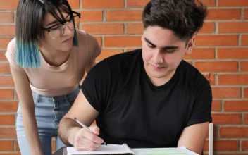 Free Video Stock Student Confused With Homework Is Helped By Her Classmate