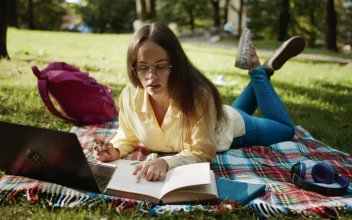 Free Video Stock Student Learning In Park With Laptop And Book