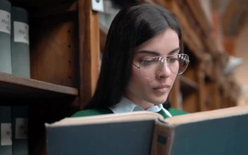 Free Video Stock Student Surprised By Something She Reads In Book