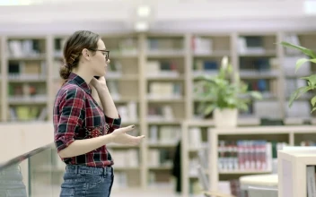 Free Video Stock Student Woman Talking On The Phone In The Library