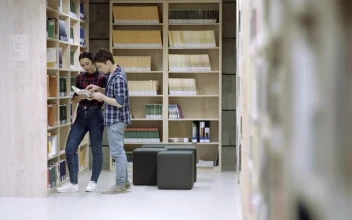 Free Video Stock Students At The Library Corridor